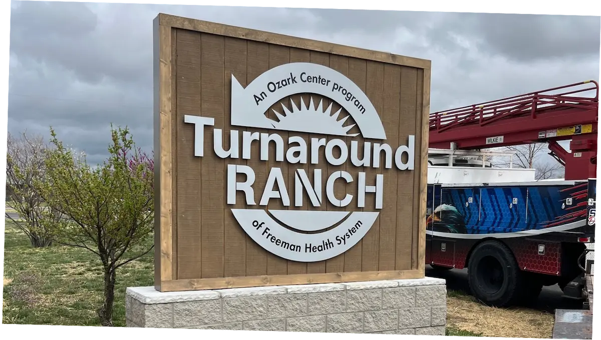 Custom monument sign installation for commercial property entrance branding